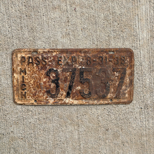 Photo of a 1938 Michigan License Plate Auto Tag Garage Decor Vintage Half Year 37537 with original patina