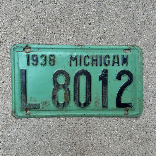 Photo of a 1938 Michigan License Plate Auto Tag Garage Decor Vintage L 8012 with original patina