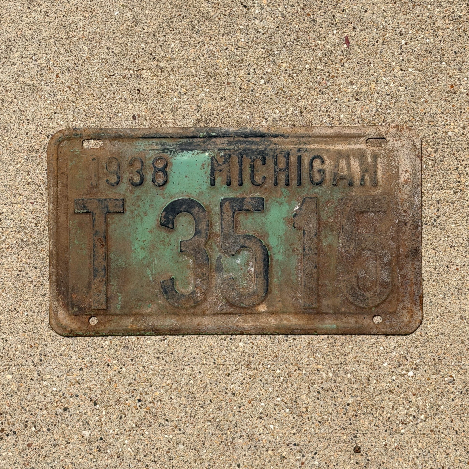 Photo of a 1938 Michigan License Plate Auto Tag Garage Decor Vintage T 3515 with original patina