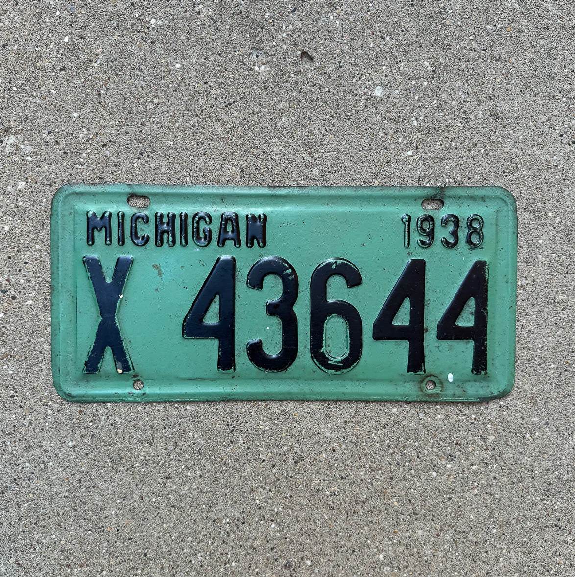 Photo of a 1938 Michigan License Plate Auto Tag Garage Decor Vintage X 43644 with original patina