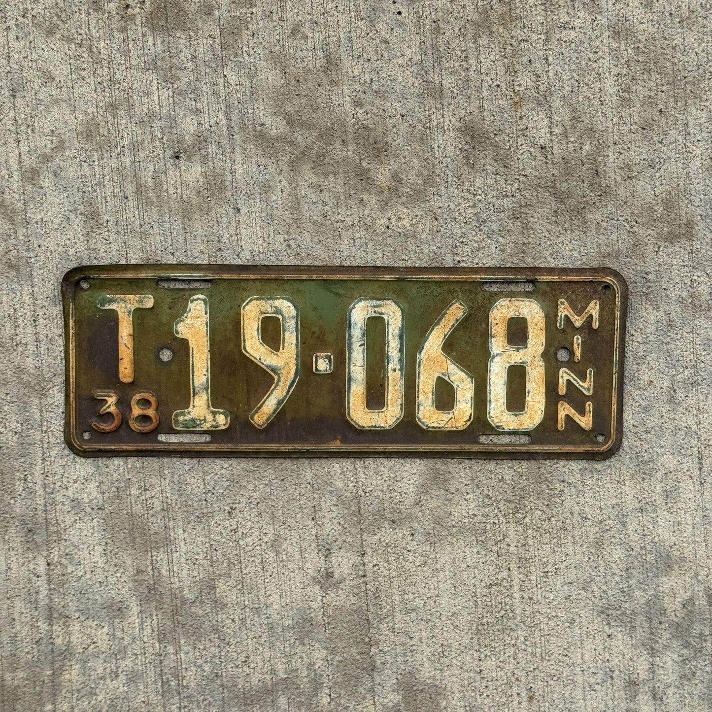 Photo of a 1938 Minnesota Farm Truck License Plate Auto Tag Garage Decor Vintage T 19 068 with original patina
