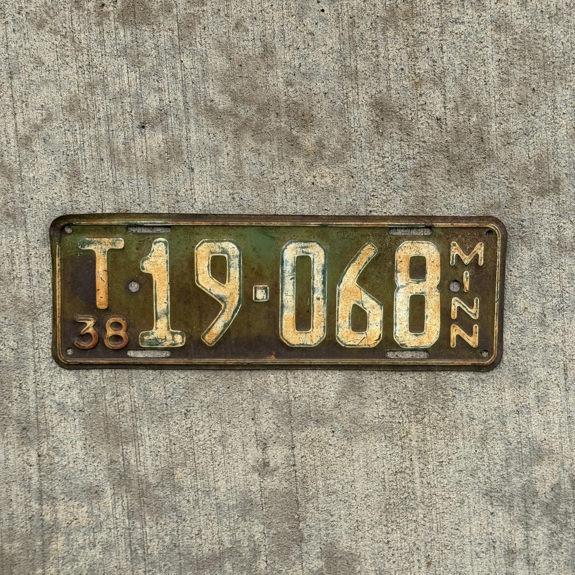 Photo of a 1938 Minnesota Farm Truck License Plate Auto Tag Garage Decor Vintage T 19 068 with original patina