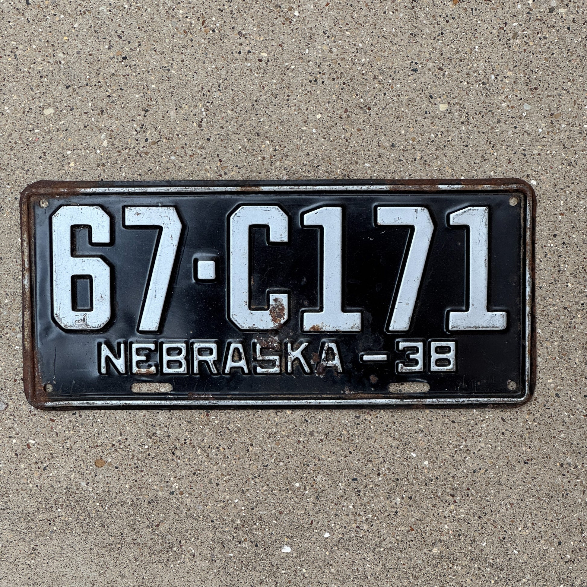 Photo of a 1938 Nebraska Commercial License Plate Auto Tag Garage Decor Vintage 67 C171 with original patina