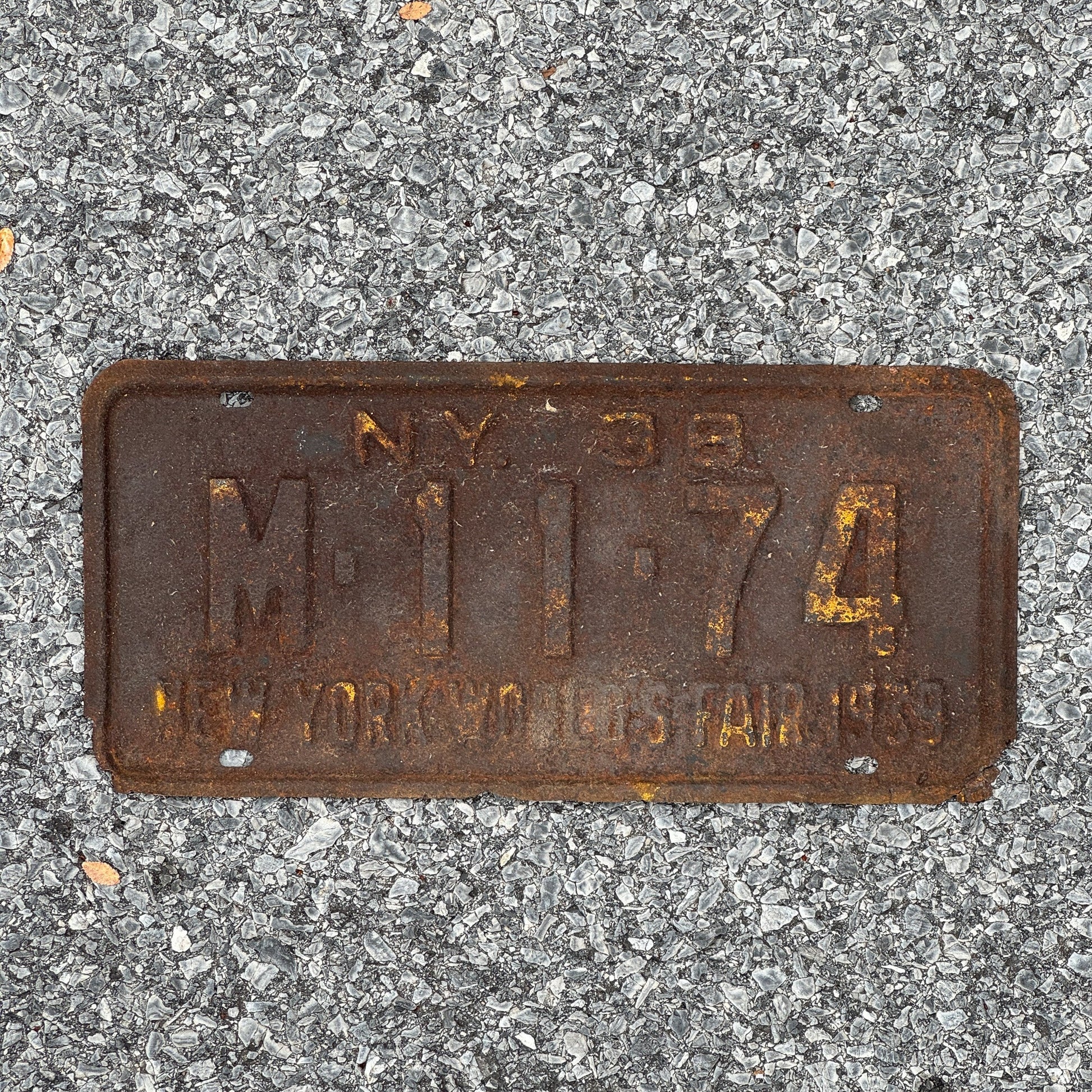 Photo of a 1938 New York License Plate Auto Tag Garage Decor Vintage World's Fair M 11 74