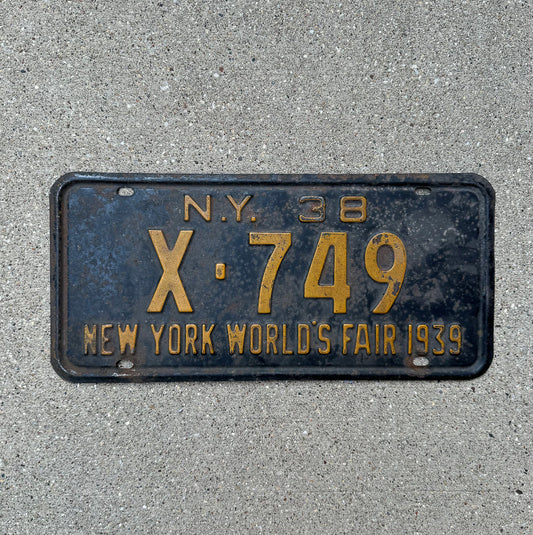Photo of a 1938 New York License Plate Auto Tag Garage Decor Vintage World's Fair X 749 with original patina