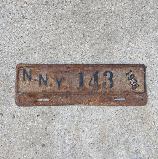 Photo of a 1938 Norfolk Navy Yard Virginia License Plate Topper Auto Tag Garage Decor Vintage NNY Military Naval Fort 143 with original patina