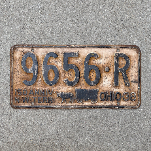 Photo of a 1938 Ohio License Plate Auto Tag Garage Decor Vintage Iconic Covered Wagon 9656 R with original patina