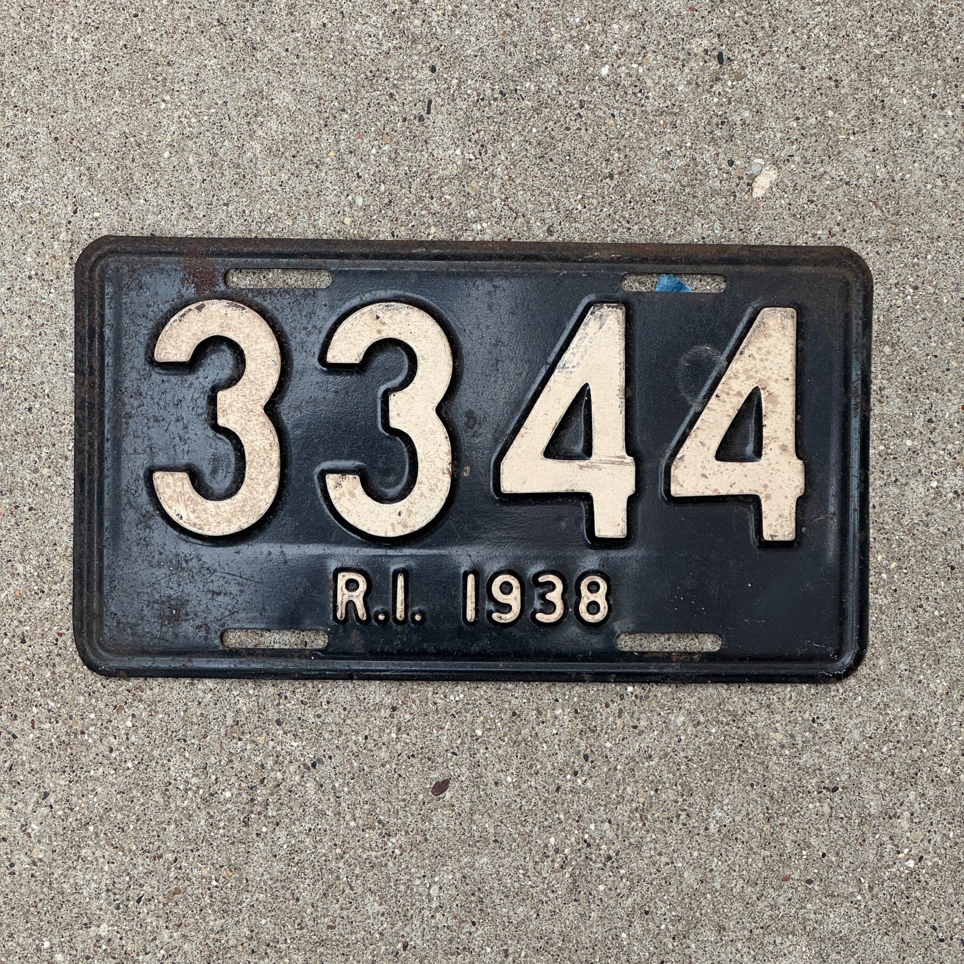 Photo of a 1938 Rhode Island License Plate Auto Tag Garage Decor Vintage Low Number Four Digit 3344 with original patina