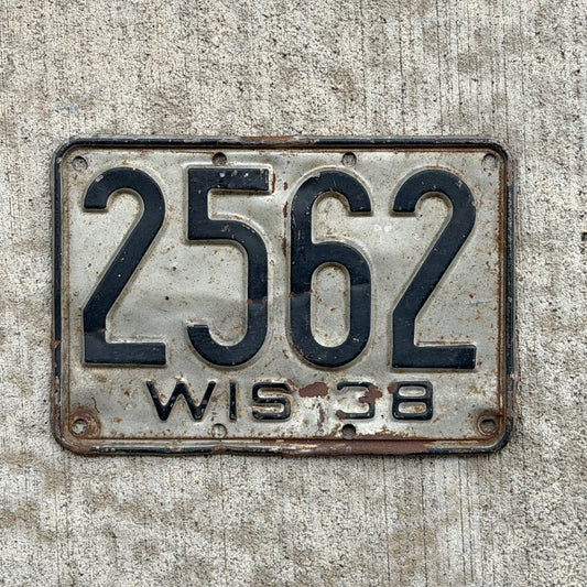 Photo of a 1938 Wisconsin License Plate Auto Tag Garage Decor Vintage Low Number Four Digit 2562 with original patina