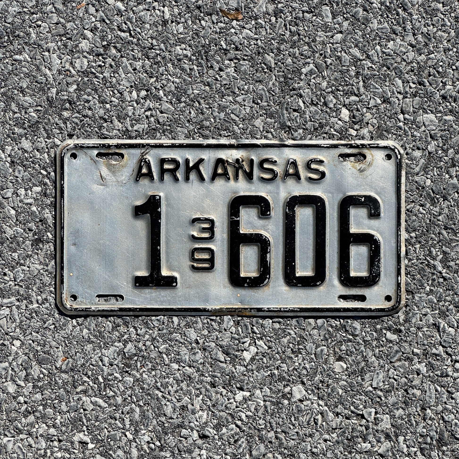 Photo of a 1939 Arkansas License Plate Auto Tag Garage Decor Vintage Four Digit Low Number 1606