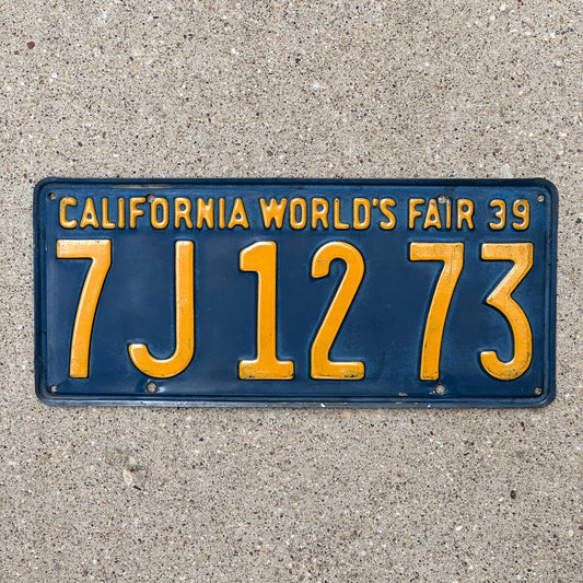 Photo of a 1939 California License Plate Auto Tag Garage Decor Vintage World's Fair 7 J 1273 with original patina