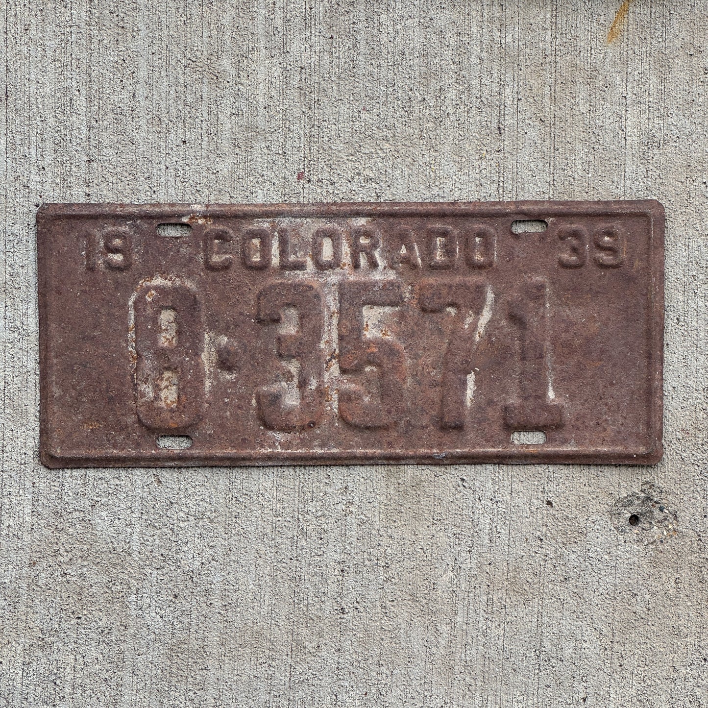 Photo of a 1939 Colorado License Plate Auto Tag Garage Decor Vintage 8 3571 with original patina