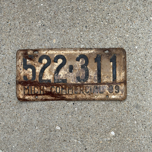 Photo of a 1939 Michigan Commercial License Plate Auto Tag Garage Decor Vintage 522 311 with original patina