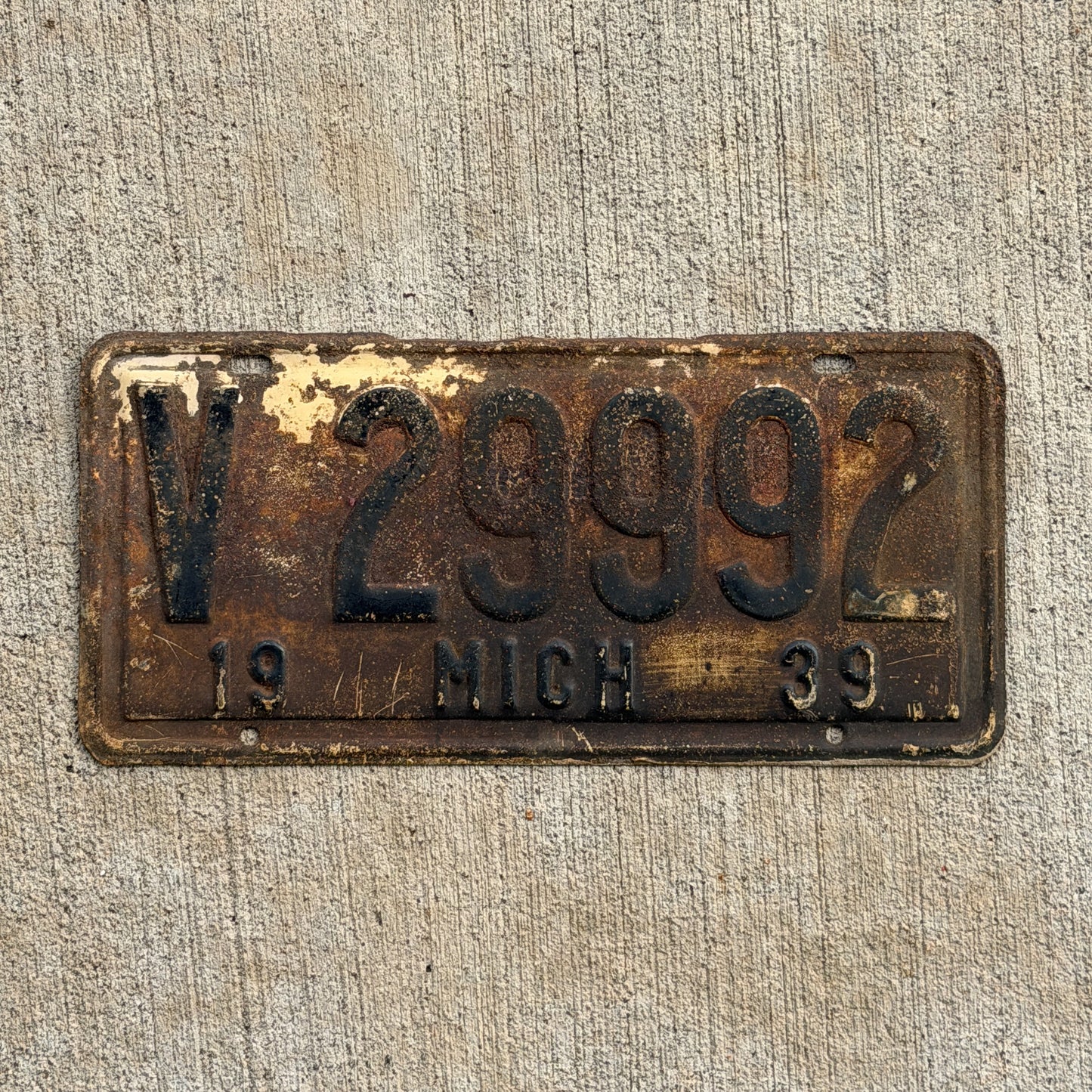 Photo of a 1939 Michigan License Plate Auto Tag Garage Decor Vintage Repeat Repeating V 29992 with original patina