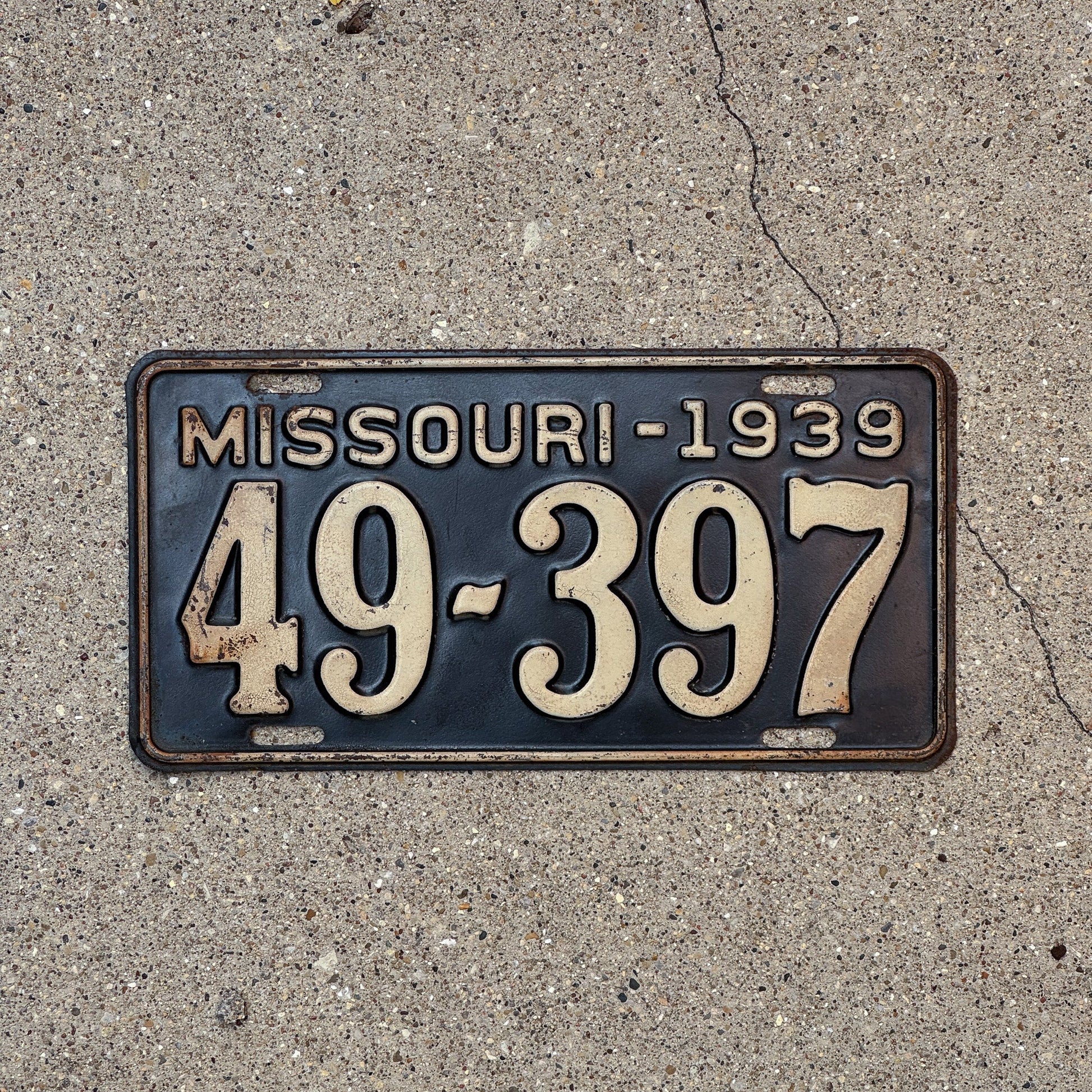 Photo of a 1939 Missouri License Plate Auto Tag Garage Decor Vintage 49 397 with original patina