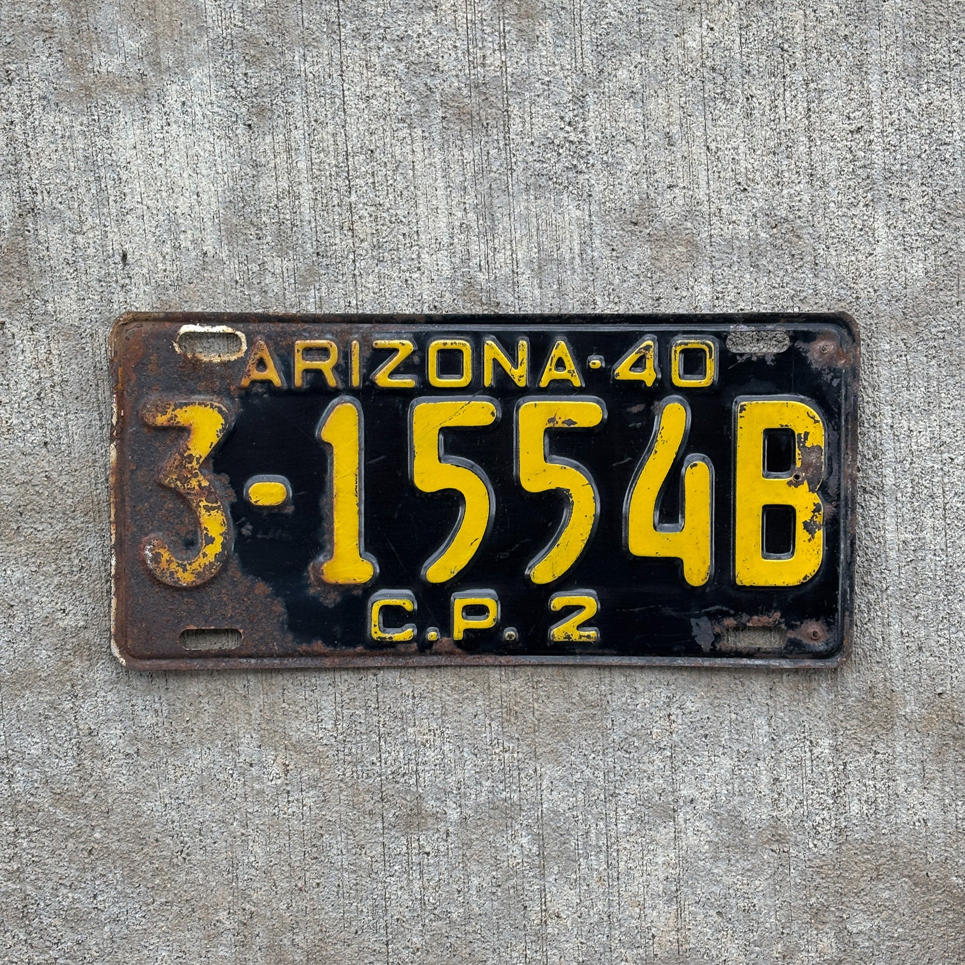 Photo of a 1940 Arizona Truck License Plate Auto Tag Garage Decor Vintage Pneumatic Tire CP 2 3 1554B with original patina
