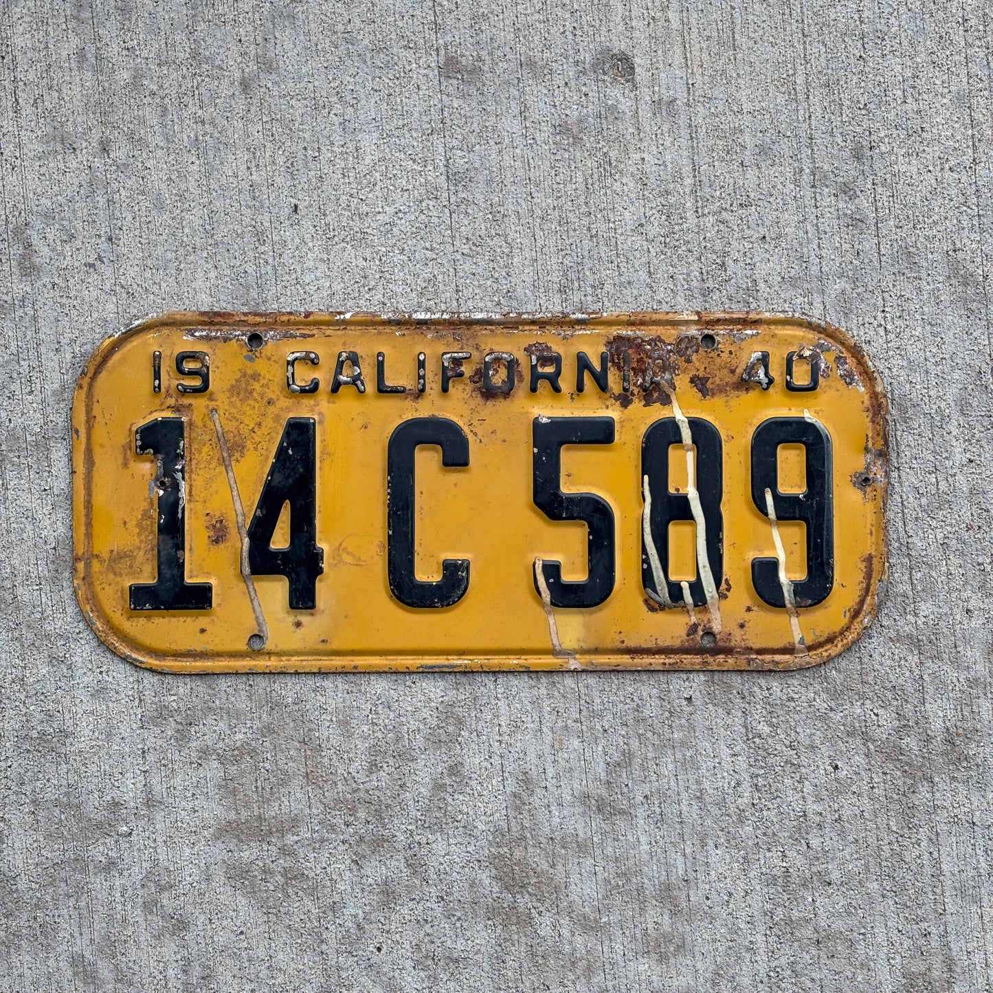 Photo of a 1940 California License Plate Auto Tag Garage Decor Vintage 14 C 589 with original patina