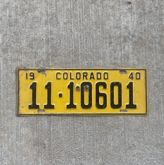 Photo of a 1940 Colorado License Plate Auto Tag Garage Decor Vintage Long Jeffreson County Repeat Repeating 11 10601 with original patina