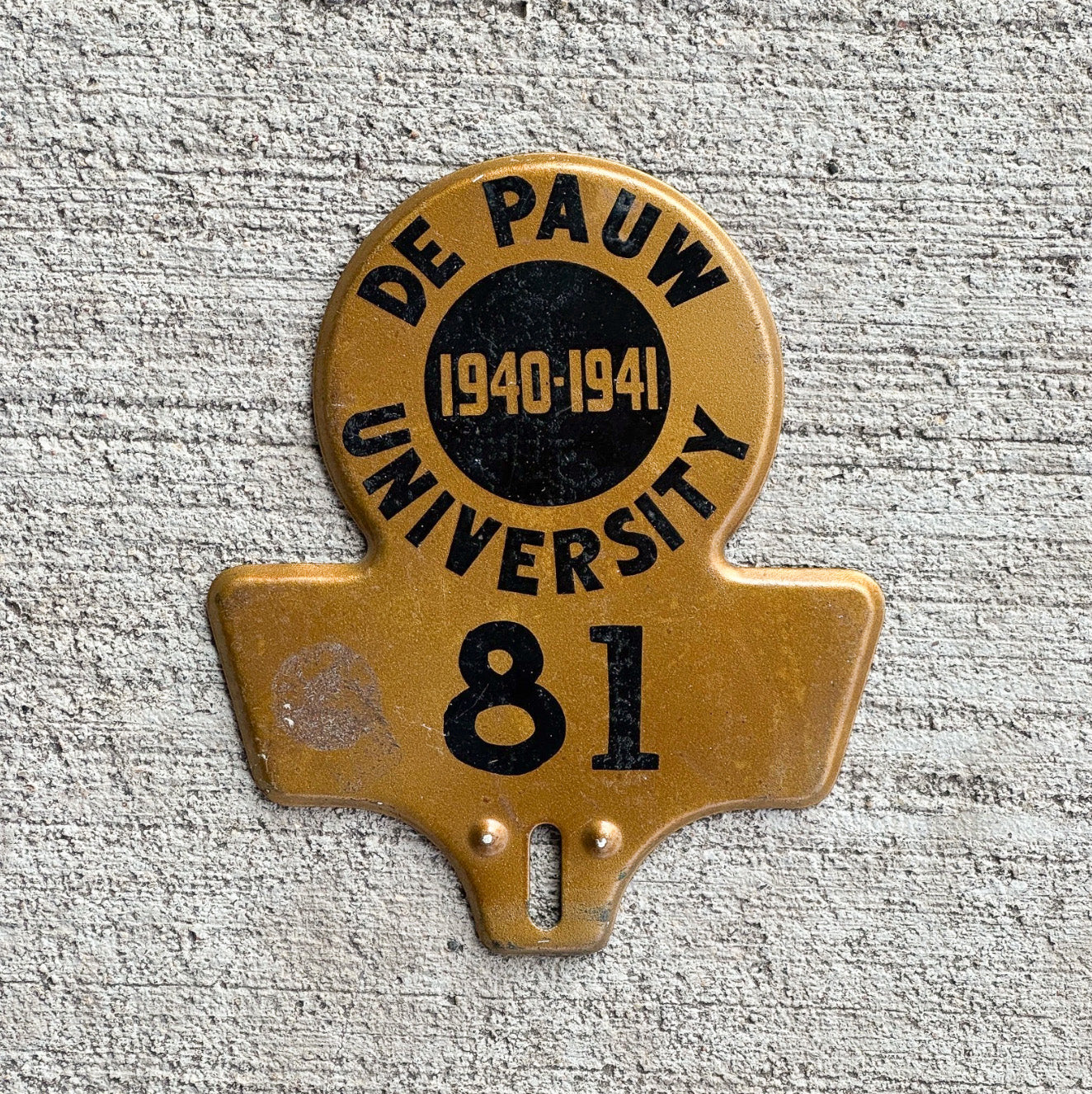 Photo of a 1940 DePauw University Indiana License Plate Topper Auto Tag Garage Decor Vintage College Sports Indiana 81 with original patina