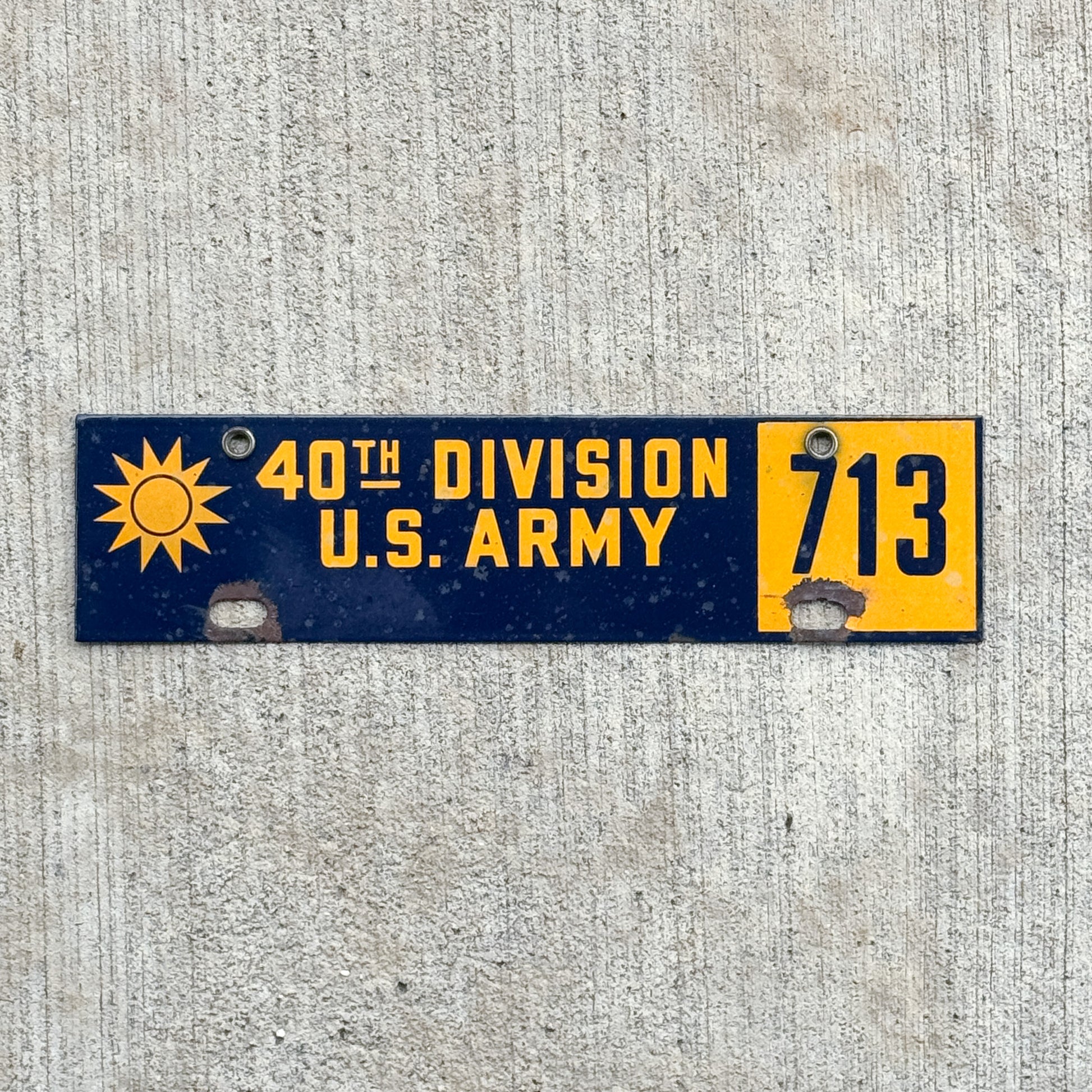 Photo of a 1940 Era California 40th Division Army Porcelain License Plate Topper 713 with original patina
