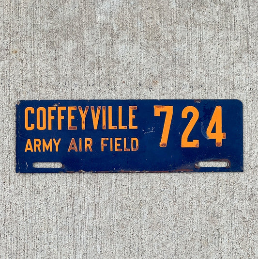 Photo of a 1940 Era Coffeyville Army Air Field Kansas License Plate Topper Auto Tag Garage Decor Vintage Military 724 with original patina
