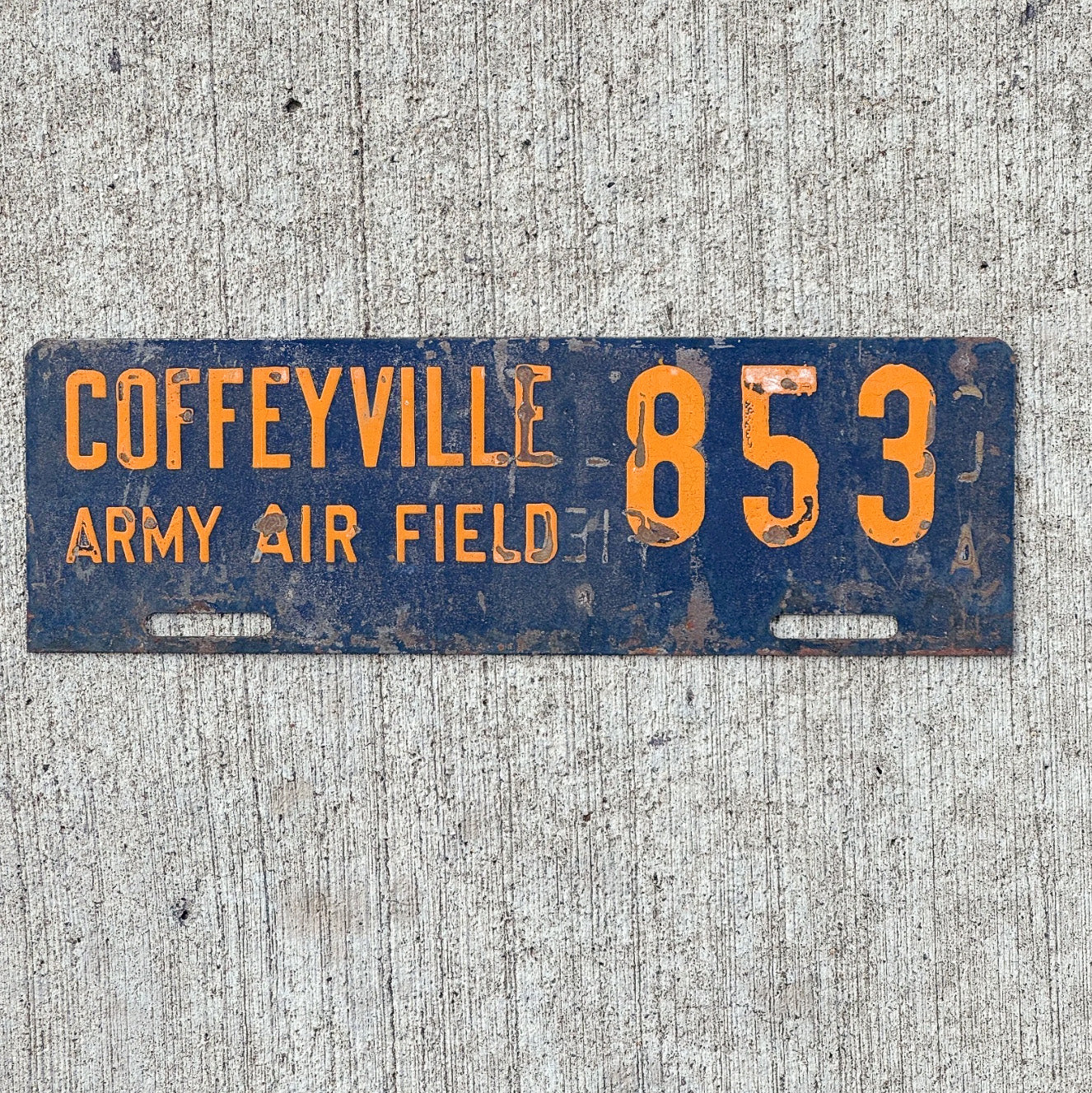 Photo of a 1940 Era Coffeyville Army Air Field Kansas License Plate Topper Auto Tag Garage Decor Vintage Military 853 with original patina
