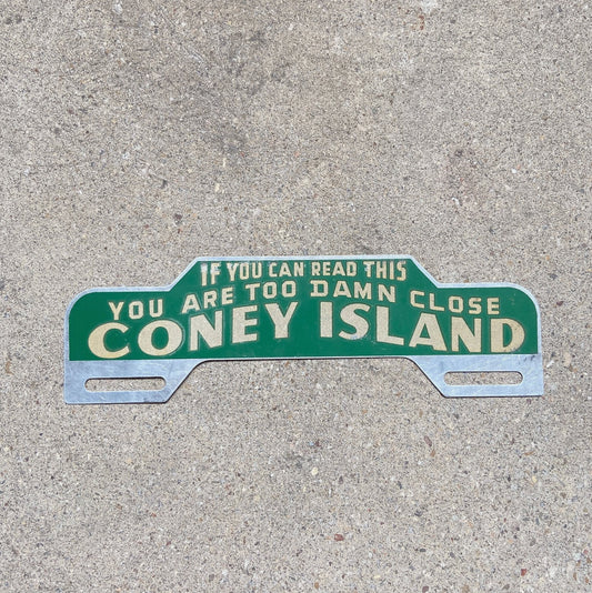 Photo of a 1940 Era Coney Island New York License Plate Topper Auto Tag Garage Decor Vintage Too Damn Close Smaltz Paint with original patina