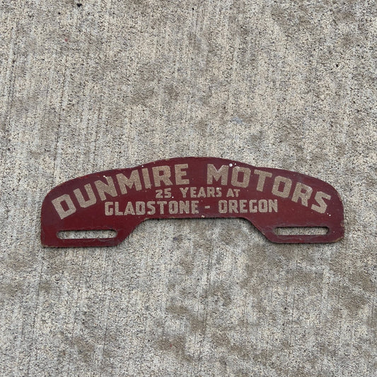 Photo of a 1940 Era Dunmire Motors Oregon Fiberboard License Plate Topper Auto Tag Garage Decor Vintage Fiber Gladstone OR WWII with original patina