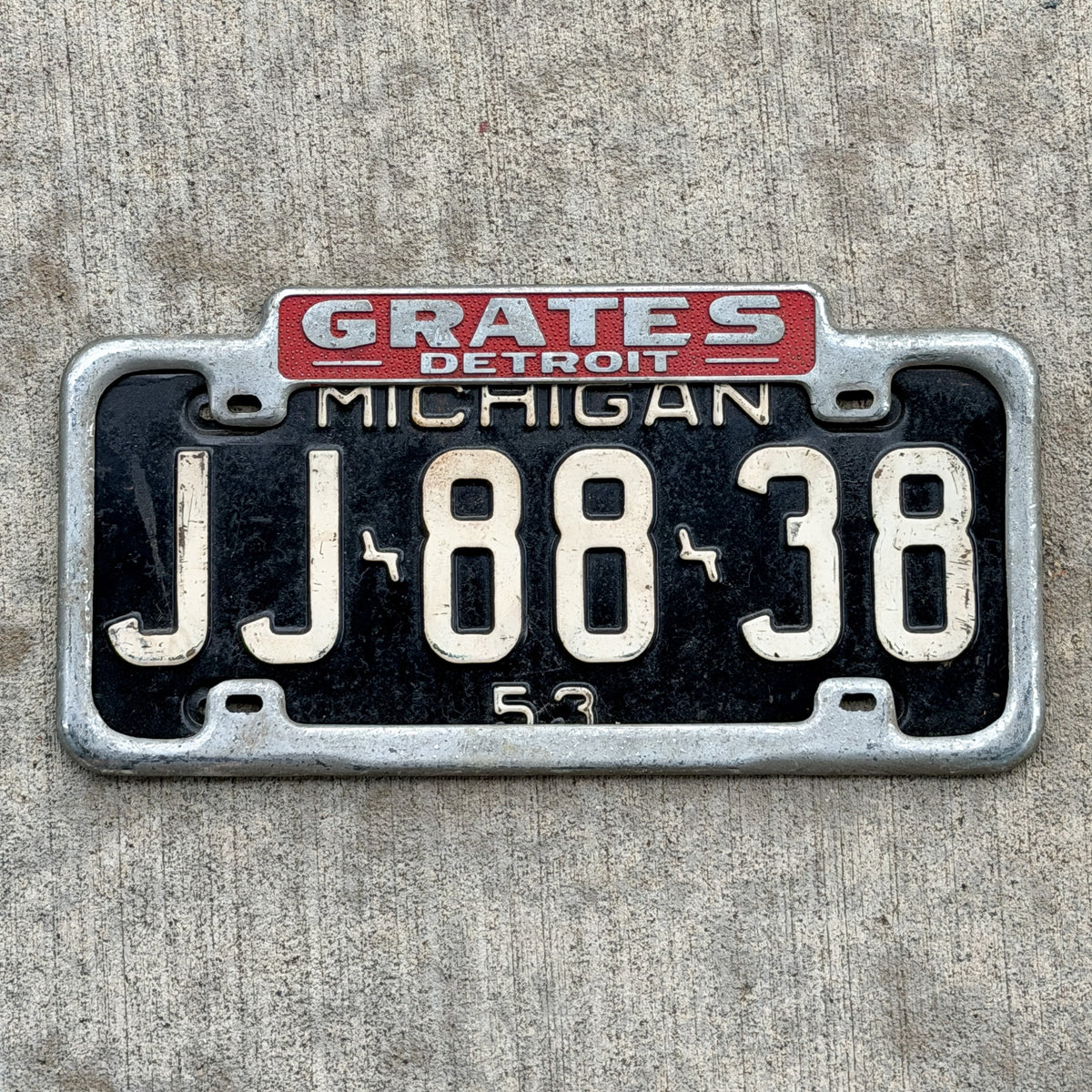 Photo of a 1940 Era Grates Detroit Michigan License Plate Frame Auto Tag Garage Decor Vintage Grates Detroit Fits a 13.75x6 Inch Plate 1942 Through 1955 with original patina