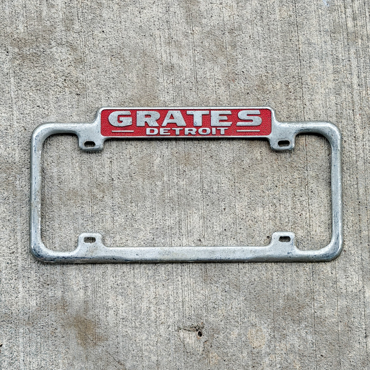 Photo of a 1940 Era Grates Detroit Michigan License Plate Frame Auto Tag Garage Decor Vintage Grates Detroit Fits a 13.75x6 Inch Plate 1942 Through 1955 with original patina
