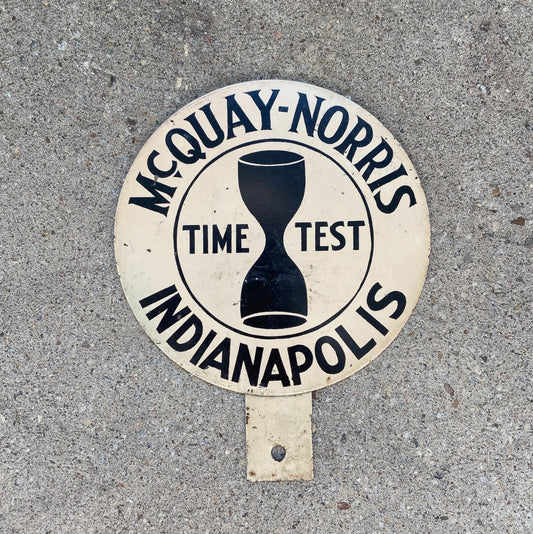Photo of a 1940 Era McQuay Norris Lollipop Indiana License Plate Topper Auto Tag Garage Decor Vintage Smitties Indianapolis Indiana with original patina