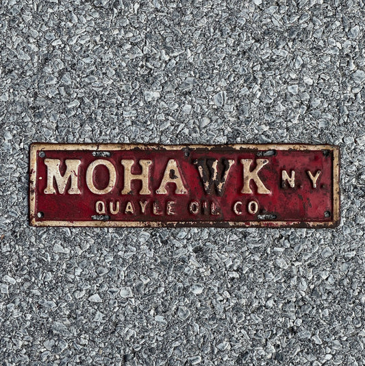 Photo of a 1940 Era Mohawk New York License Plate Topper Auto Tag Garage Quayle Oil Co Gas Oil Collectible with original patina