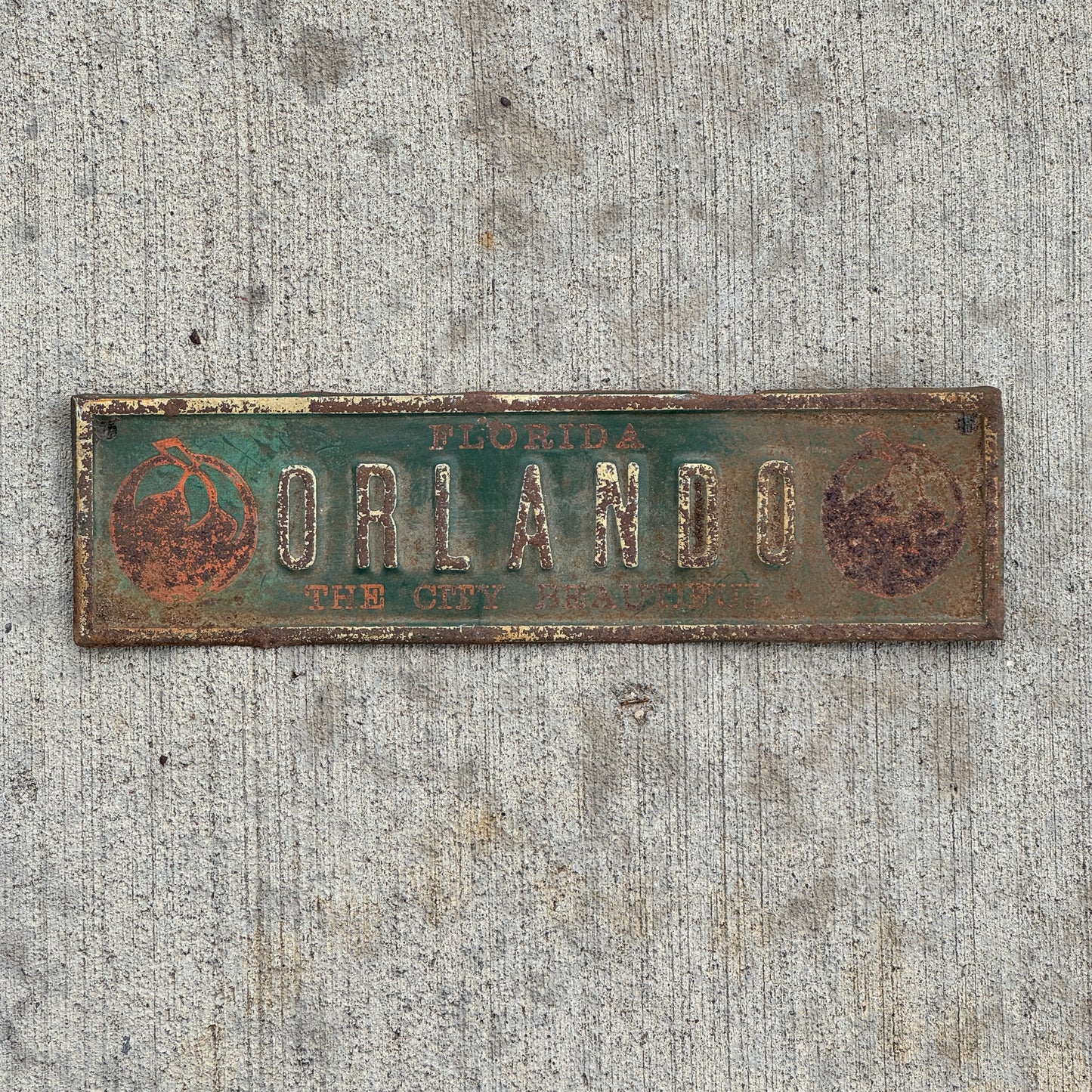 Photo of a 1940 Era Orlando Florida License Plate Topper Auto Tag Garage Decor Vintage The City Beautiful with Oranges with original patina