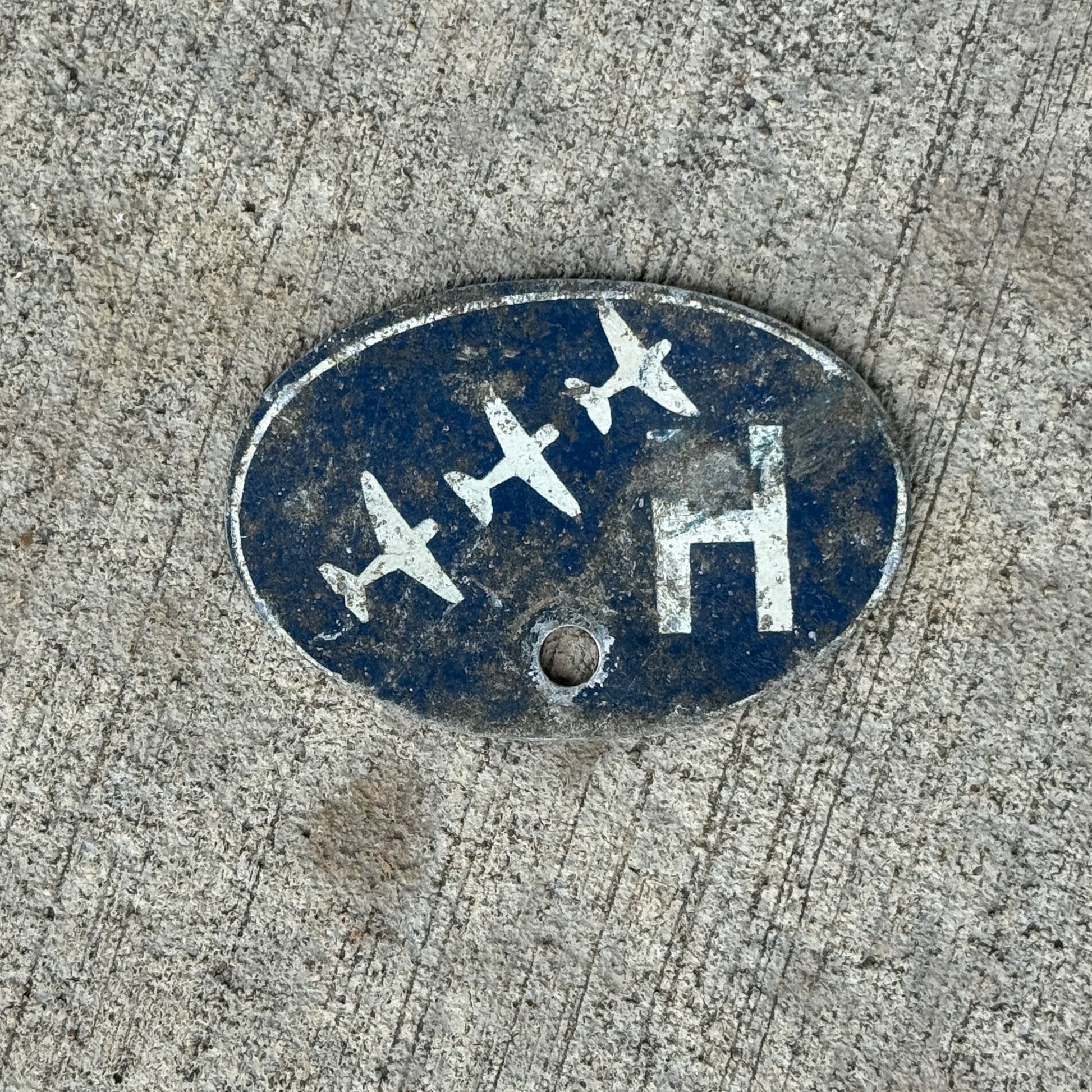 Photo of a 1940 Era Republic Aviation Corp Auto Tag Garage Decor Vintage Parking Permit WW2 Home Front with original patina