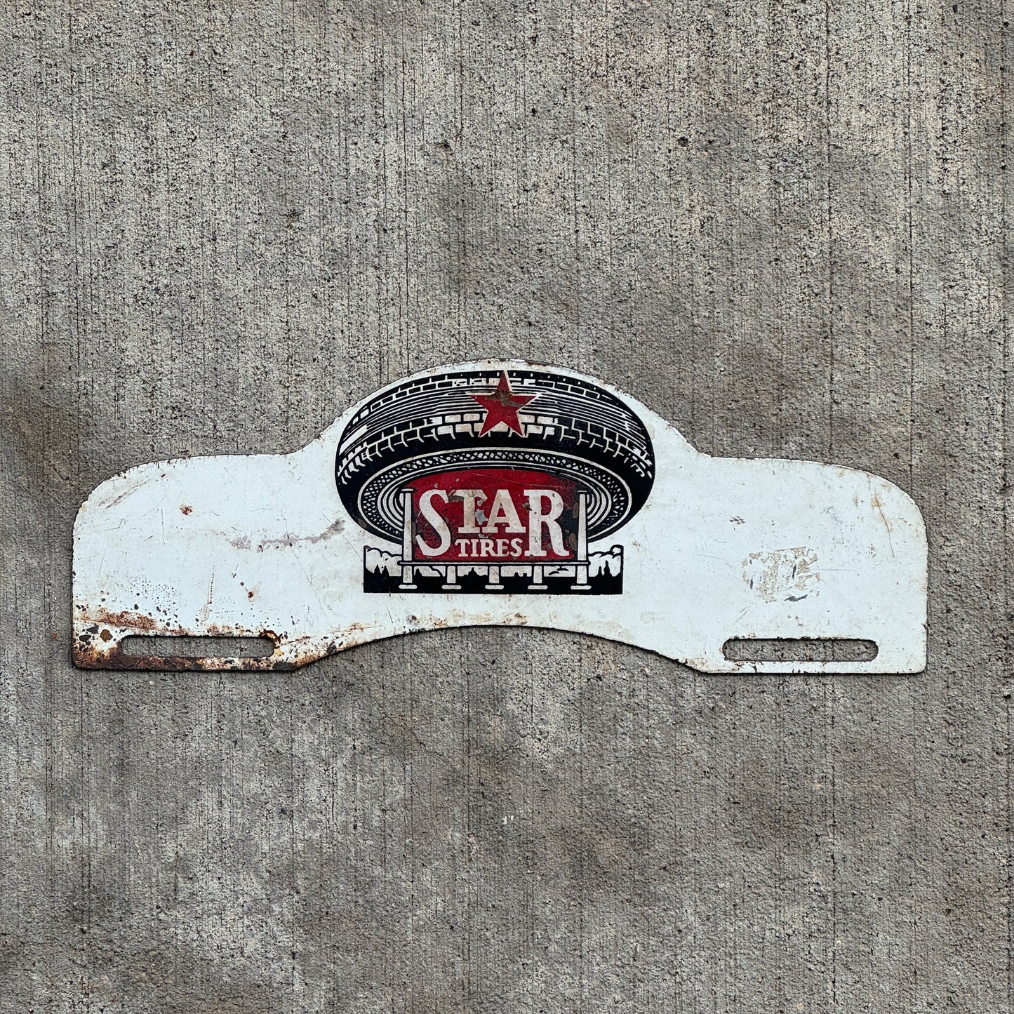 Photo of a 1940 Era Star Tires License Plate Topper Auto Tag Garage Decor Vintage Antique Auto Advertising with original patina