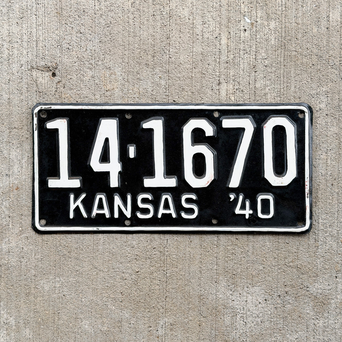 Photo of a 1940 Kansas License Plate Auto Tag Garage Decor Vintage 14 1670 with original patina
