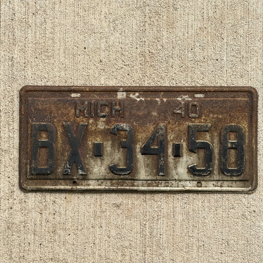 Photo of a 1940 Michigan License Plate Auto Tag Garage Decor Vintage BX 34 58 with original patina