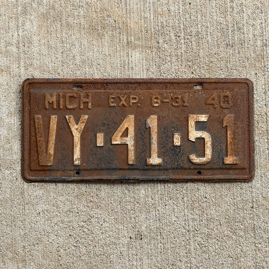 Photo of a 1940 Michigan License Plate Auto Tag Garage Decor Vintage Half Year VY 41 51 with original patina