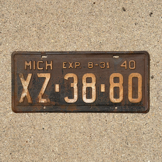 Photo of a 1940 Michigan License Plate Auto Tag Garage Decor Vintage Half Year XZ 38 80 with original patina