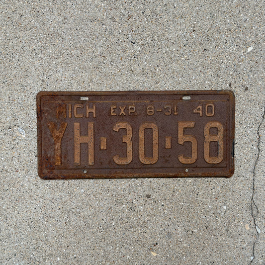 Photo of a 1940 Michigan License Plate Auto Tag Garage Decor Vintage Half Year YH 30 58 with original patina