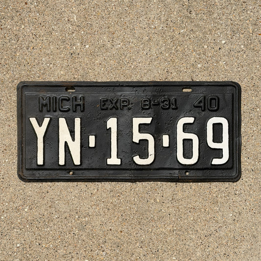Photo of a 1940 Michigan License Plate Auto Tag Garage Decor Vintage Half Year YN 15 69 with original patina