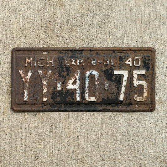 Photo of a 1940 Michigan License Plate Auto Tag Garage Decor Vintage Half Year YY 40 75 with original patina