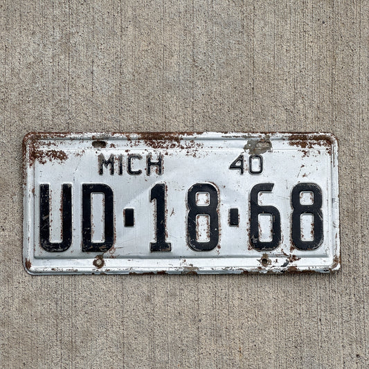 Photo of a 1940 Michigan License Plate Auto Tag Garage Decor Vintage Kalkaska County UD 1868 with original patina