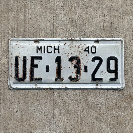 Photo of a 1940 Michigan License Plate Auto Tag Garage Decor Vintage Montmorency County UE 1329 with original patina