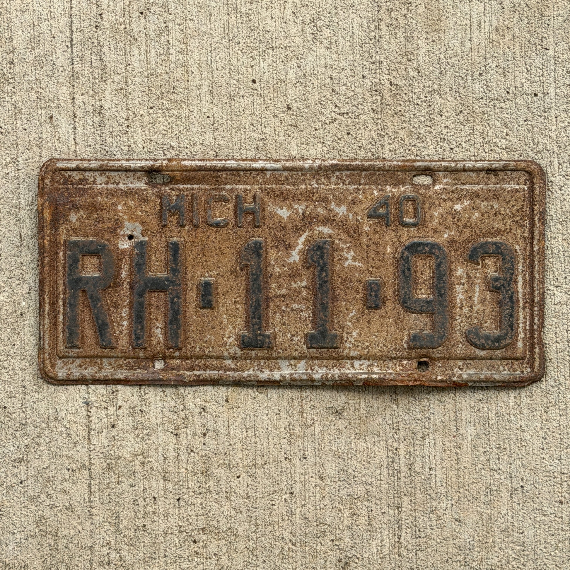 Photo of a 1940 Michigan License Plate Auto Tag Garage Decor Vintage RH 11 93 with original patina