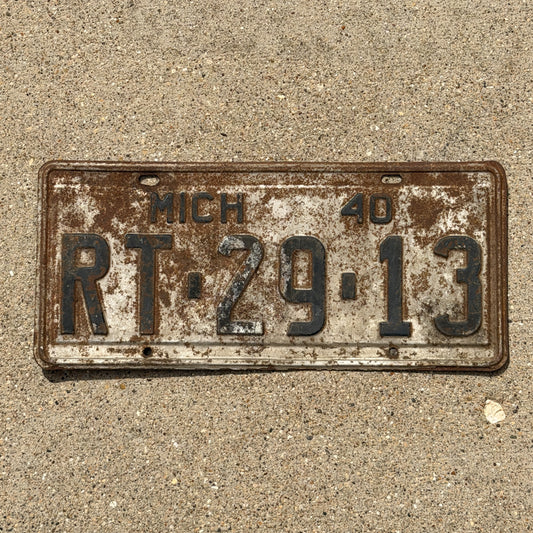 Photo of a 1940 Michigan License Plate Auto Tag Garage Decor Vintage RT 29 13 with original patina