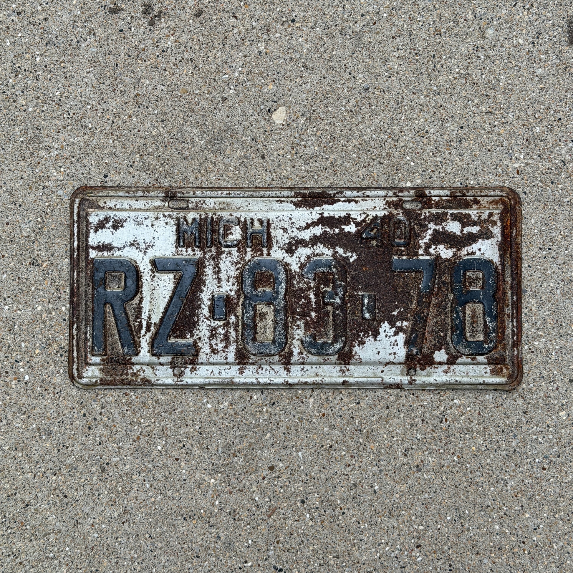Photo of a 1940 Michigan License Plate Auto Tag Garage Decor Vintage RZ 83 78 with original patina