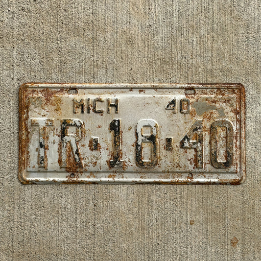 Photo of a 1940 Michigan License Plate Auto Tag Garage Decor Vintage TR 18 40 with original patina