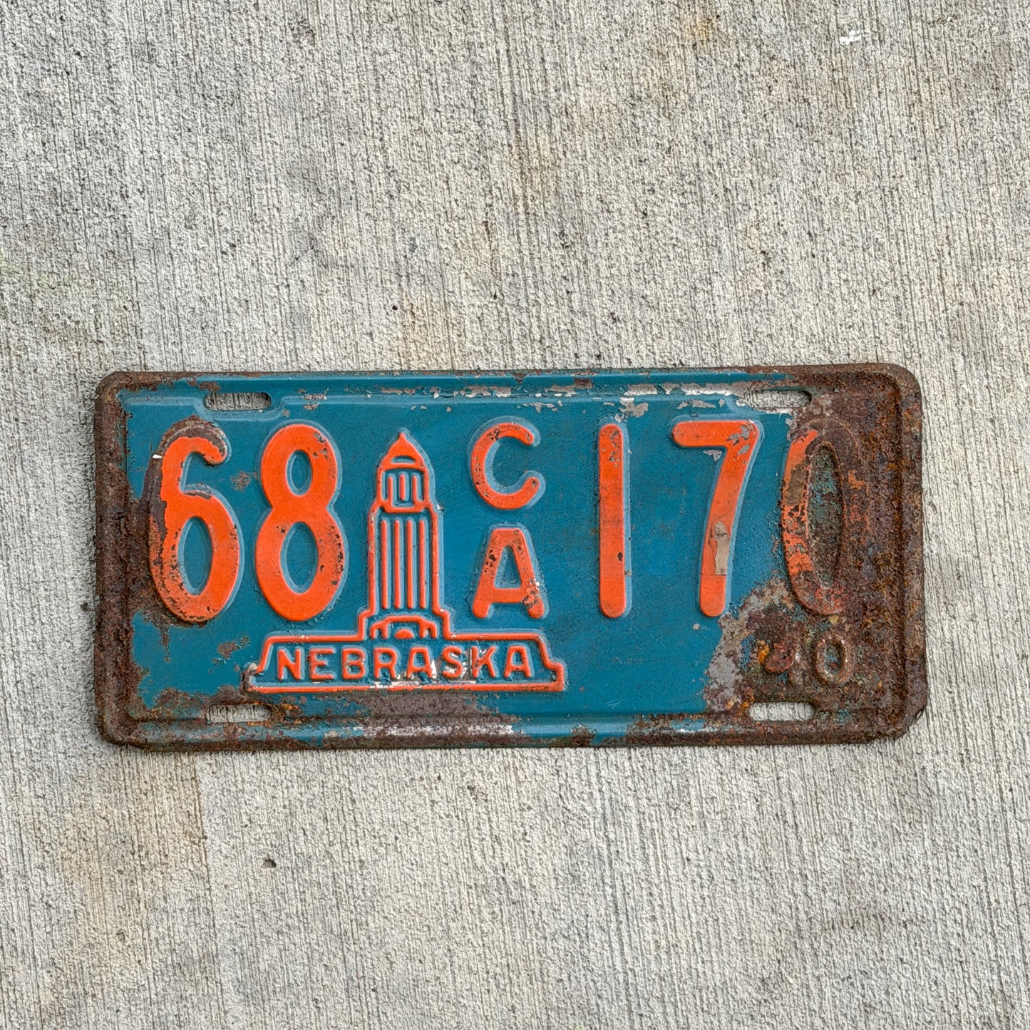 Photo of a 1940 Nebraska License Plate Auto Tag Garage Decor Vintage Iconic Capital Building 68 CA 170 with original patina