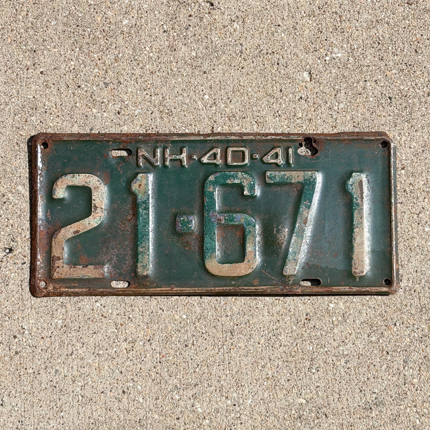 Photo of a 1940 New Hampshire License Plate Auto Tag Garage Decor Vintage 21 671 with original patina
